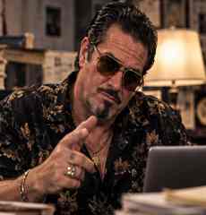 Fictional newsroom portrait of Ricky Montana